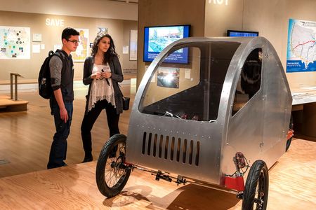 Cars are a liability and expensive to maintain for most Americans. The Future Cycles team builds human-powered vehicles that combine the efficiency of a bicycle or moped with the weather protection and carrying capacity of a car.