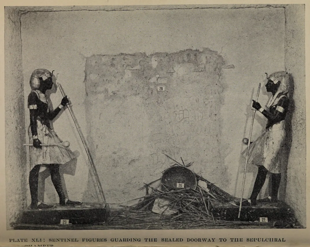 Two statues guarding King Tutankhamun's tomb