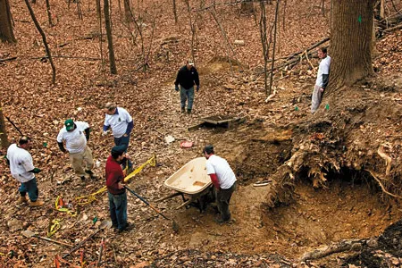 During the era of horse-drawn railroads, workers filled in a ravine at Duffy's Cut.