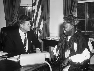 President John F. Kennedy meets with William Fitzjohn, Sierra Leone&#39;s charge d&rsquo;affairs in Washington, in the Oval Office on April 27, 1961.