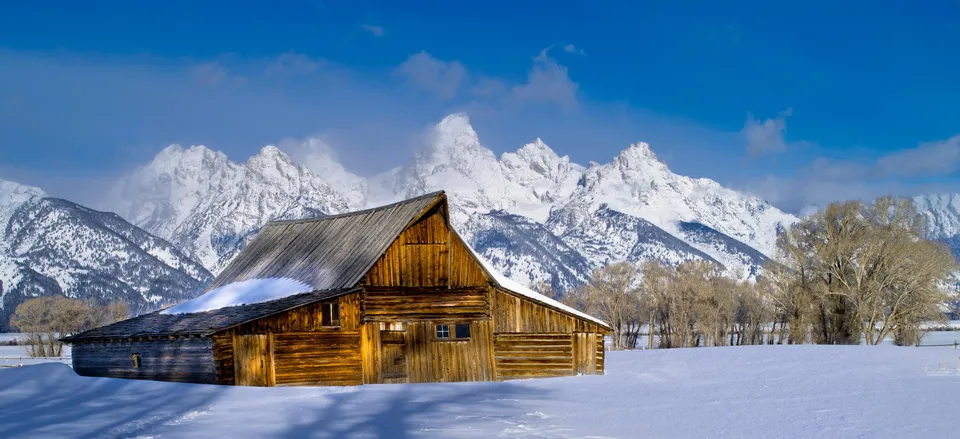 Yellowstone in Winter Explore a wonderland where geysers and waterfalls glaze the landscape in sparkling ice