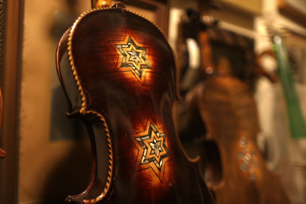 Star of David visible on back of violin
