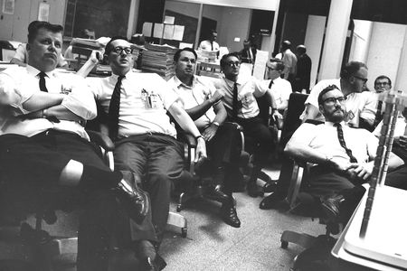 John Newcomb (fourth from left) and other members of the Lunar Orbiter team watch the first Earthrise picture come in, August 1966.