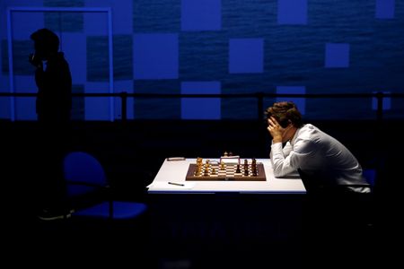 Chess world champion Magnus Carlsen, seen here competing in 2021, has accused 19-year-old Hans Niemann of cheating in recent games.