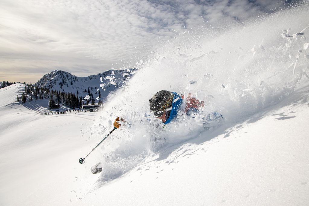 Skier shredding powder in utah