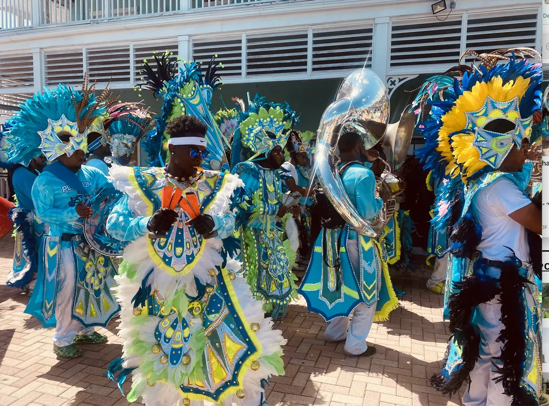 Dancers and musicians celebrate Junkanoo in the Bahamas