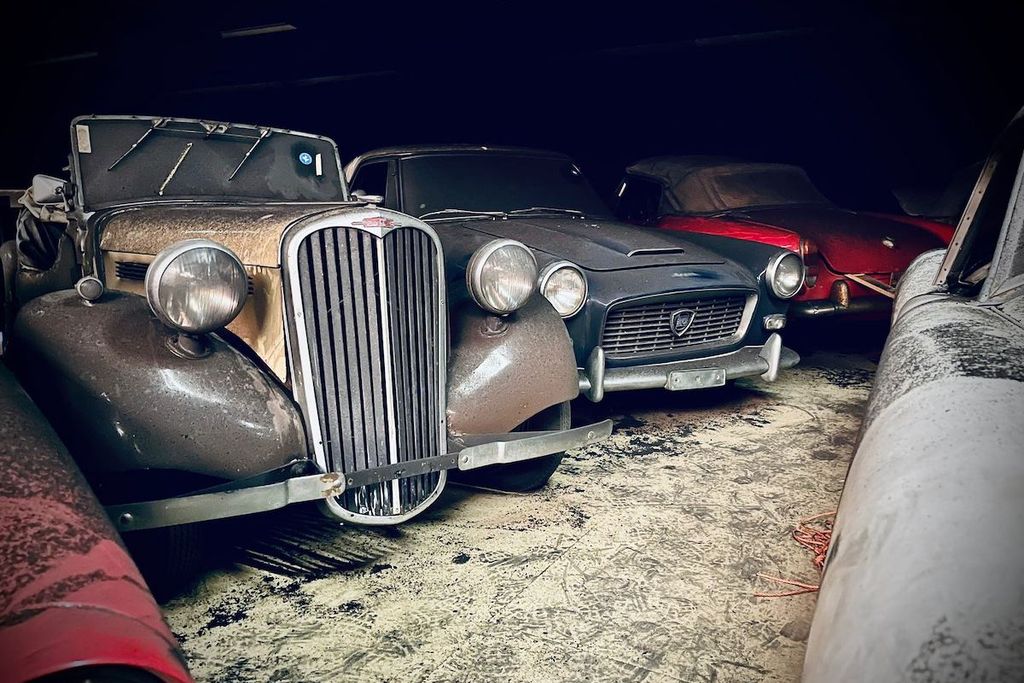 Classic car in dimly lit warehouse