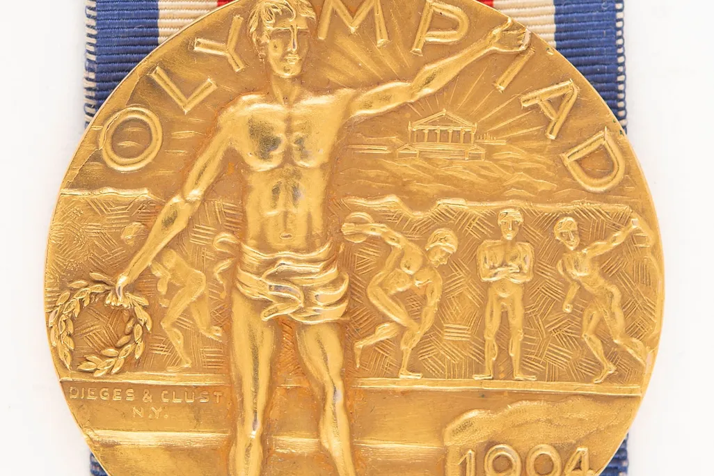 Close-up shot of gold medal from 1904 Olympics