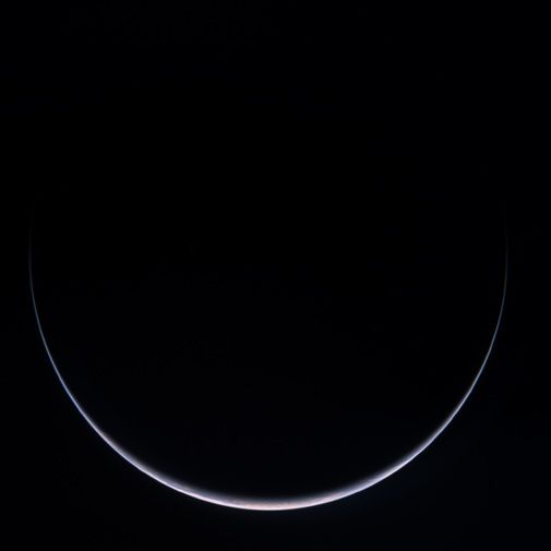 A comet-bound spacecraft swings past its home planet.