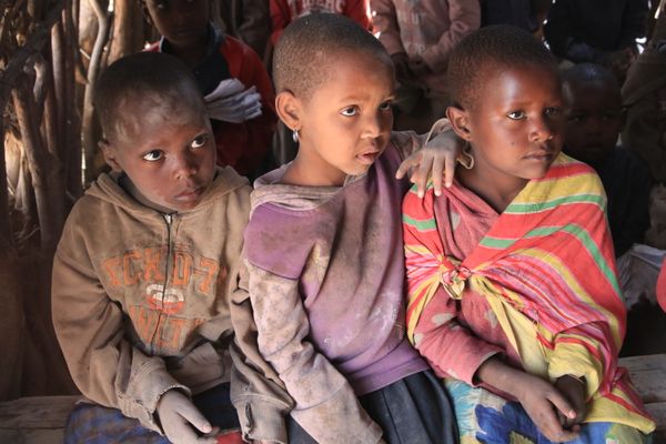 Three School Children at Masai Village thumbnail