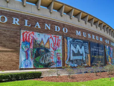 Signs for the Jean-Michel Basquiat exhibitition outside the Orlando Museum of Art on March 25, 2022