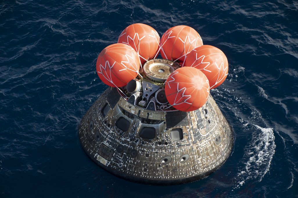 The Orion spacecraft sits in the Pacific Ocean