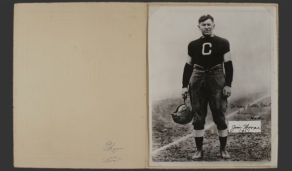 Jim Thorpe (Sac and Fox), with the inscription “To my little girl Grace From Dad Jim Thorpe 1951.” The photo, in the original folder frame, shows Thorpe during his career with the Canton Bulldogs football team, ca. 1915 to 1920. Grace Thorpe Collection, NMAI.AC.085 (pht_092_002). (National Museum of the American Indian Archives Center, Smithsonian)