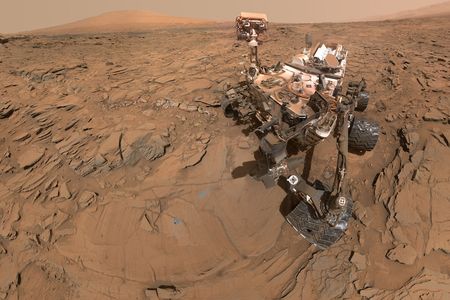 This self-portrait of Curiosity shows the vehicle at a drilled sample site called "Okoruso," on the "Naukluft Plateau" of lower Mount Sharp. It combines multiple images taken with the Mars Hand Lens Imager (MAHLI) on May 11, 2016, during the 1,338th Martian day.