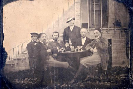 According to some scholars Vincent Van Gogh sits third from the left in this photograph. Surrounding him are artist Emile Bernard, politician Félix Jobbé-Duval, actor André Antoine and artist Paul Gauguin. 