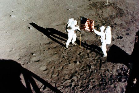 Armstrong and Aldrin plant the U.S. flag on the moon, July 1969.