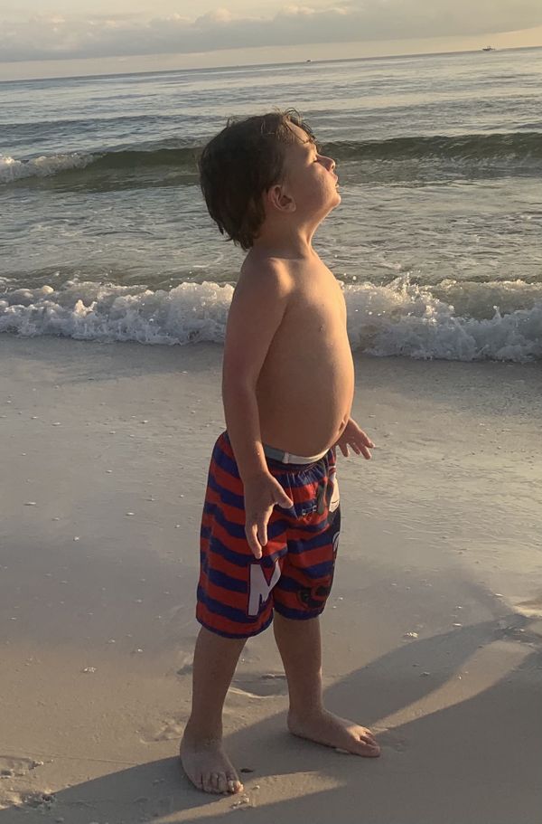 Grandson enjoying the warmth of the October Sun in Panama City Beach , Fl thumbnail