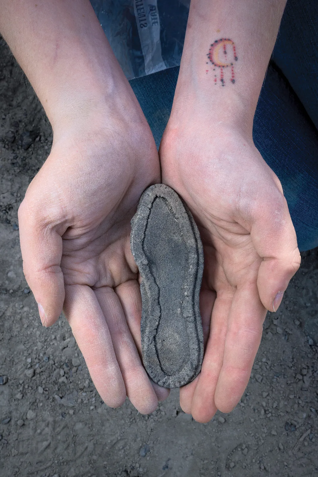 The leather sole of a child’s shoe