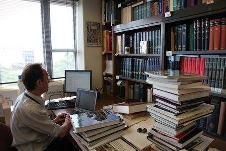 Research Associate Alain Touwaide, seated in his office in the Natural History Museum, argues Rome’s great expansion was driven not by geopolitical strategy, but by a need for plants.