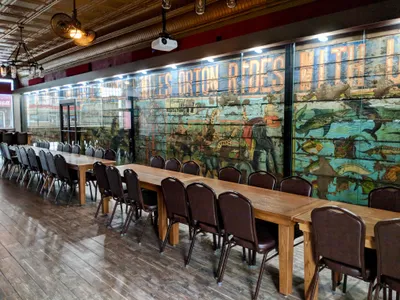 The134-year-old circus advertisement was crafted using lithograph, a material meant to degrade over time. After uncovering it in the Corral Bar and Riverside Grill, the family who owns the establishment restored and encased in glass.