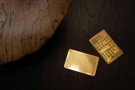 From his home in Ontario,&nbsp;Samuel Peralta displays a sample gold NanoFiche&mdash;similar to the smaller,&nbsp;nickel-based NanoFiche that will be traveling to the lunar surface.

