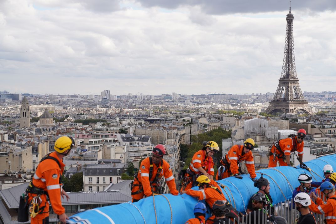 The Arc de Triomphe Is Wrapped in Fabric, Just as the Late Artists Christo and Jeanne-Claude Planned It