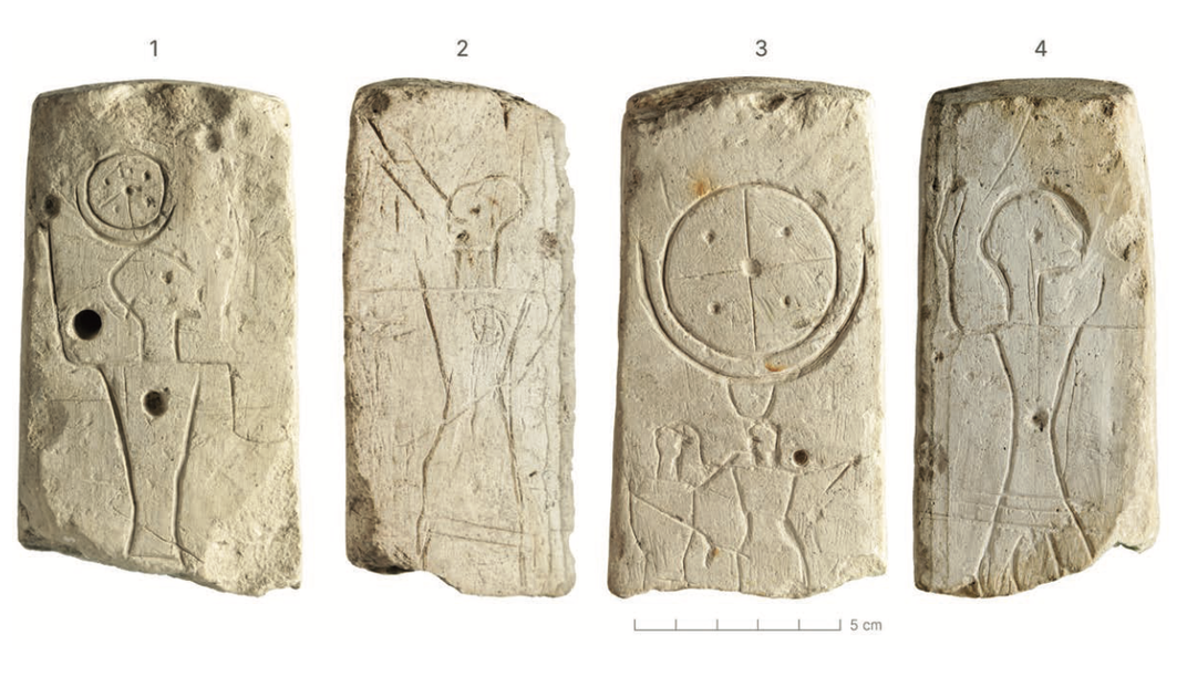 Four stone panels