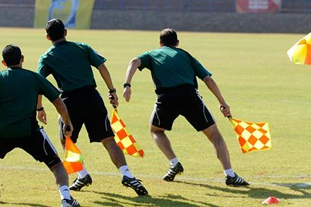 For officials, the road to the World Cup is as competitive and demanding as it is for players.
