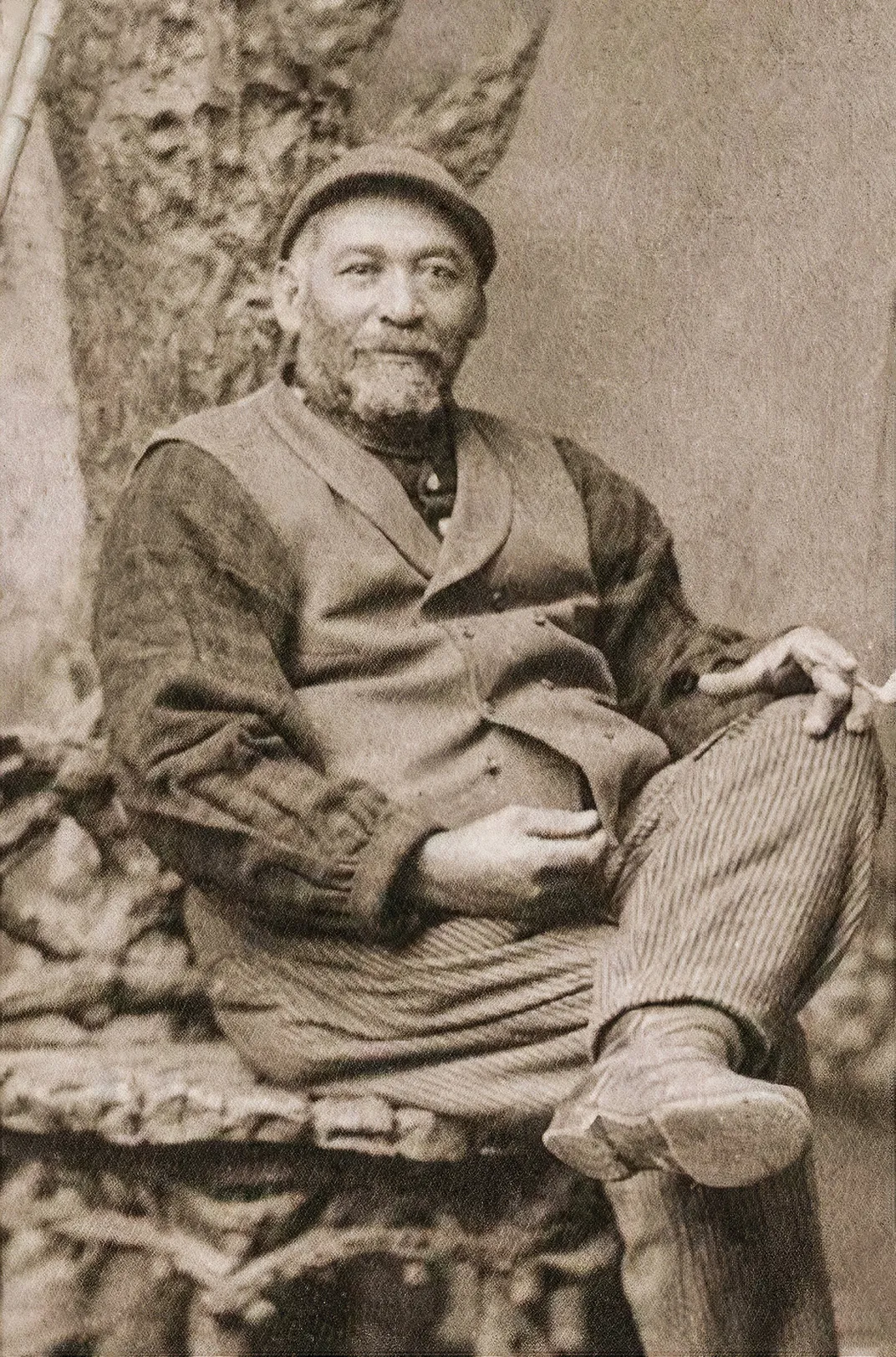a man sitting for a portrait
