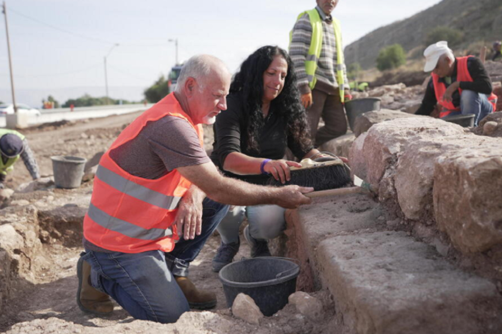 Archaeologists at excavation site