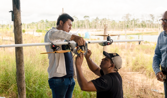 In the Peruvian Amazon, drones like this one are being used to monitor and prevent future destruction of the rainforest from artisanal gold mining. Photo by Guy Loftus for Conservation X Labs.