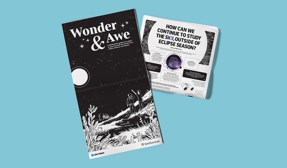 Light blue background with a newspaper extended featuring the words "Wonder & Awe" and a folded newspaper highlighting eclipse news
