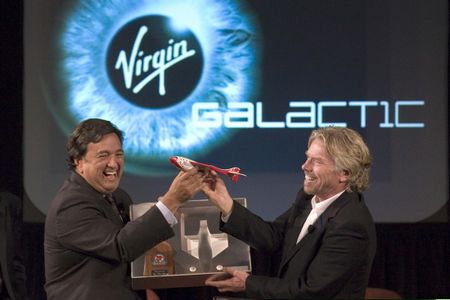 Back in 2005 Virgin Galactic and New Mexico worked out a deal for the state to build a multimillion dollar spaceport. Here's Richard Branson (right) giving Governor Bill Richardson a model airplane to commemorate the occasion. 