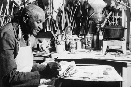 Botanist George Washington Carver, seen here in a 1940 photo, donated $33,000 in cash to the Tuskegee Institute to establish a fund to carry on the agricultural and chemical work he began.