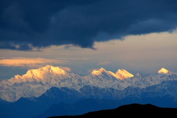 The first ray of the sun fall on the peaks of Himalaya. thumbnail