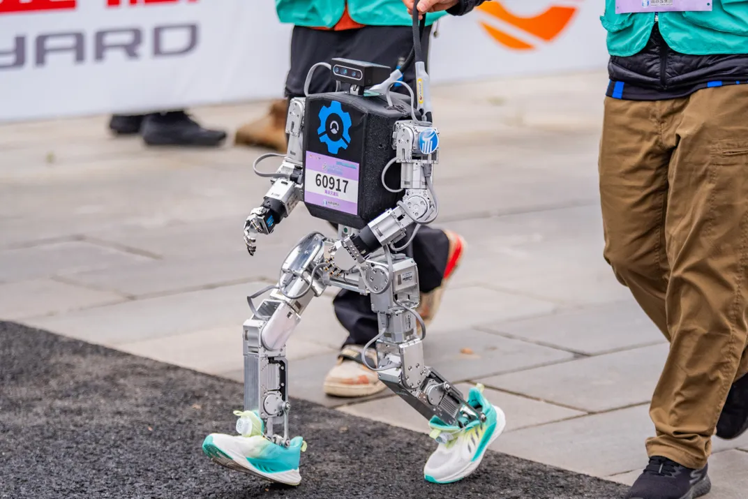 A small humanoid races in human running shoes.