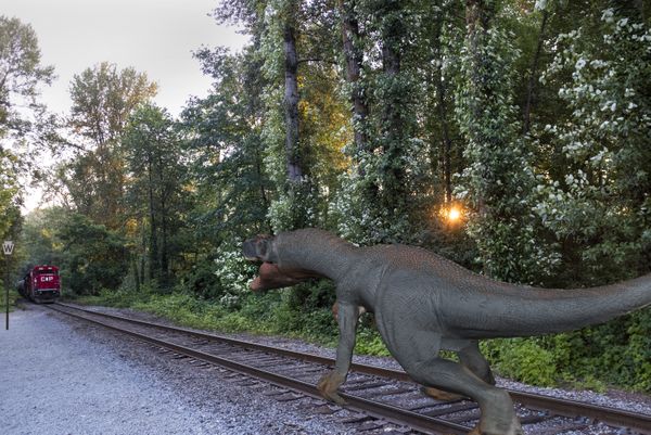 Dinosaur running on tracks. thumbnail