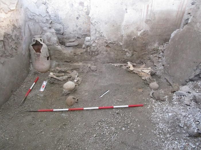 Two skeltons in an archaeological pit