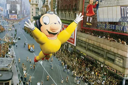 A colorized photo of superhero rodent Mighty Mouse&rsquo;s exuberant turn in the 1951 parade.