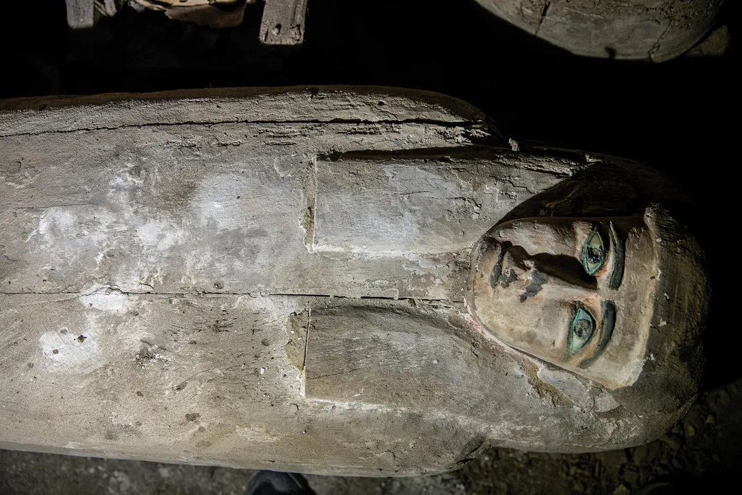 The tilted mask on coffin