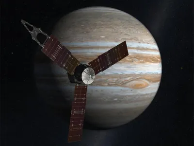 An artist's rendition of Juno in orbit around Jupiter. The craft is powered entirely by the sun's rays. 