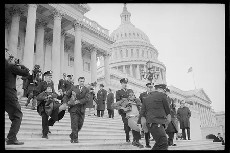 Police remove peaceful protestors from a sit-in at the U.S. Capitol in 1965.