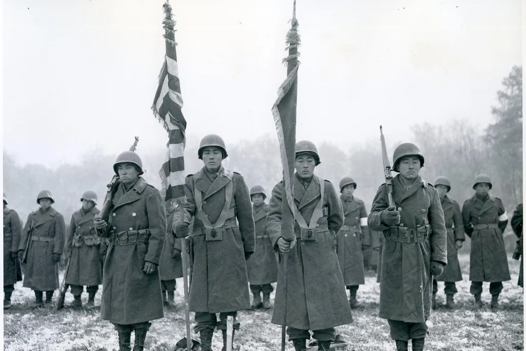 Stunned survivors of the Lost Battalion rescue stand ready for review by General Dahlquist