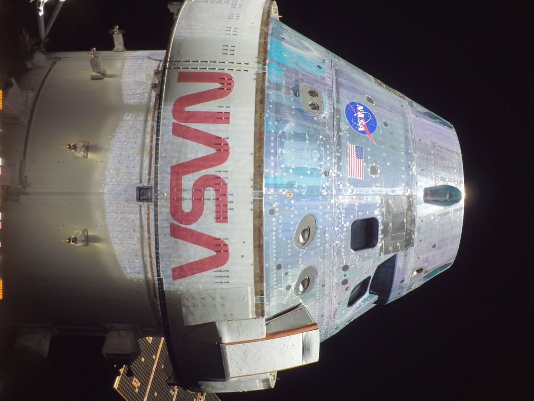 sideways spacecraft labeled NASA