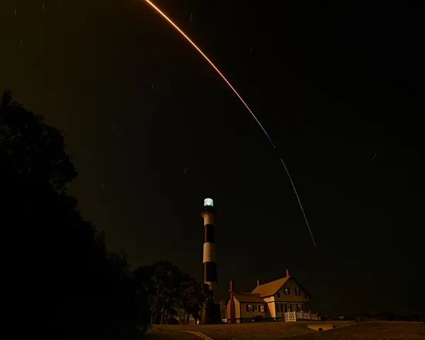Cape Canaveral Lighthouse in the light of a rocket thumbnail