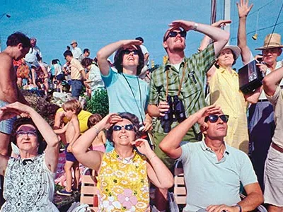 Crowd looking at Apollo 11 launch
