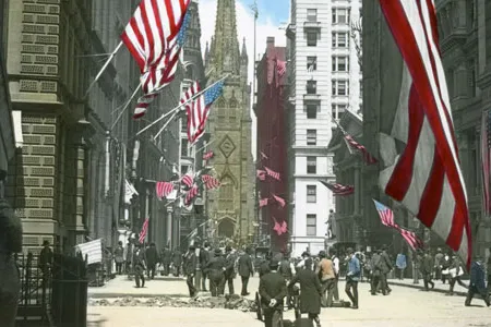 Wall Street with Trinity Church in the distance.