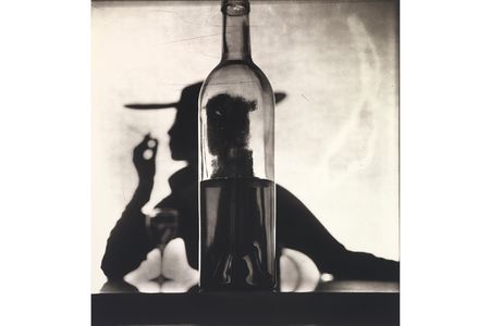 Girl Behind Bottle (Jean Patchett) by Irving Penn, New York, 1949, printed 1978