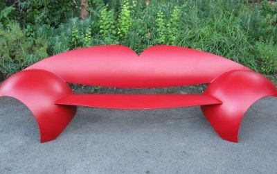 Selig's "Propane Tank Lips Bench" references Dali’s "May West Lips Sofa."