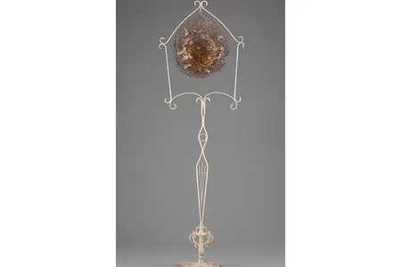 "Bird," 1990, David Hammons, painted metal, wire, basketball and feathers.